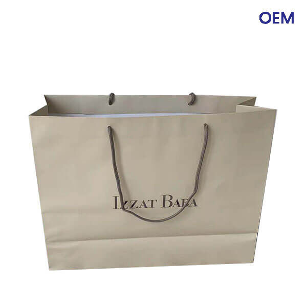 PG42 beige color luxury art paper bags 1 color printing + logo hot silver