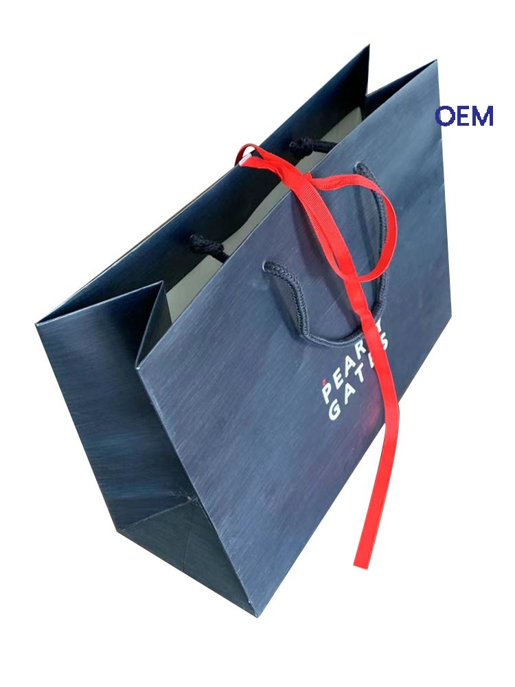 PG010 paper bag with ribbon and embossing