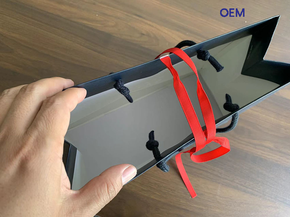 PG010 paper bag with ribbon and embossing